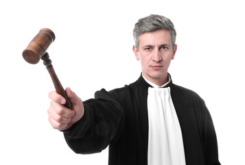 Naklejka premium Judge with mallet in court dress on white background