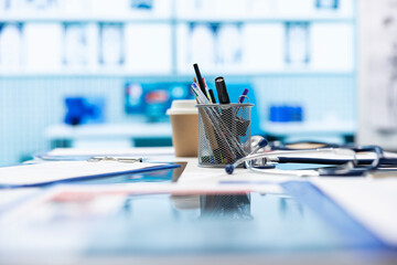 Empty medical cabinet equipped with modern equipment designed to help in finding the right diagnostic, x ray machine and hospital records. Private clinic office space for healthcare industry.