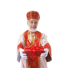 Fototapeta premium Saint Nicholas giving gift on white background