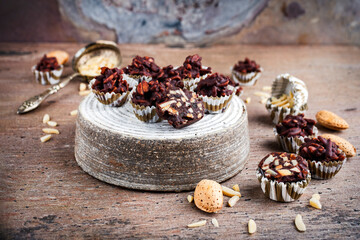 artisan handcrafted fine dark chocolate pralines with crushed almonds