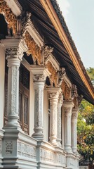 Fototapeta premium Decorative architectural details of a building exterior with columns