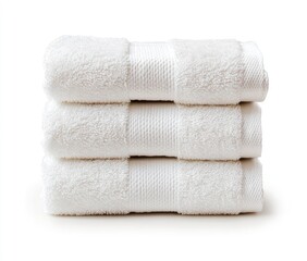 Stack of three fluffy white bath towels.