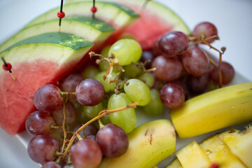 An Exquisite and Fresh Assortment of Seasonal Fruits Presented in a Lively and Vibrant Way