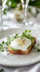 Delicious Poached Egg and Avocado Toast: A Healthy, Vibrant Brunch Choice with Organic Microgreens and Artisan Presentation