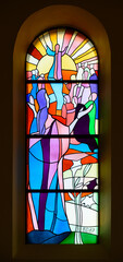 The Ascension of Jesus into Heaven. A stained-glass window in the St James Church in Medjugorje, Bosnia and Herzegovina.