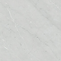 A smooth, light gray marble surface with subtle white veining