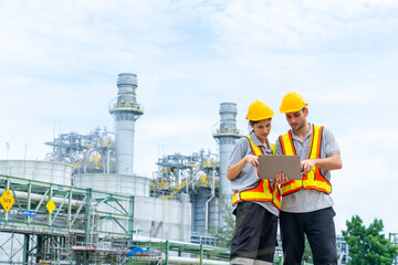 Petrochemical factory industry engineer teamwork meeting discussion at petroleum oil refinery...