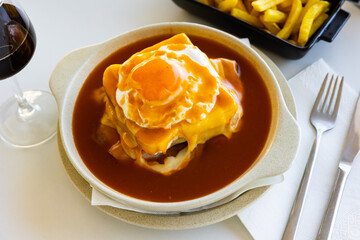 Francesinha - typical food from Porto. Portuguese cuisine