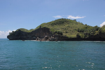 Naklejka premium cliff at the beach of java coastline