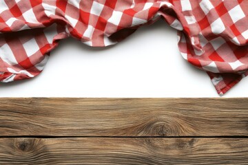 Obraz premium Red checkered tablecloth on wooden surface