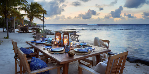 Fototapeta premium Romantic beach dinner setup with sunset view and elegant table setting