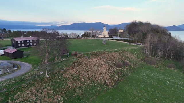Aerial view of Frei church at Rastarkalv at sunset in Rastarkalv, in Kristiansund, Norway