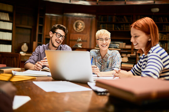 Young and diverse group of students studying in a university library