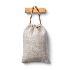 Off White Drawstring Bag with Gray Geometric Pattern Hanging on Wooden Peg