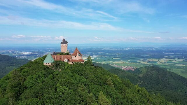 The Haut-Koenigsbourg Castle dominates the Alsatian plain, in Europe, in France, in Alsace, in the Bas Rhin, towards Strasbourg, in summer, on a sunny day.&nbsp;