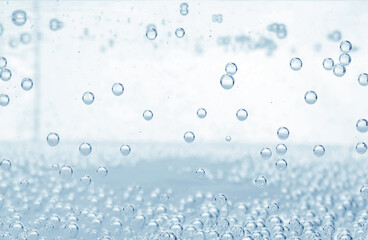 Soda water with bubbles as background, closeup