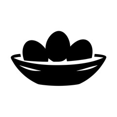 Three simple black eggs in a woven nest on a white background