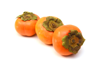 Stack persimmon fruits isolated on white background