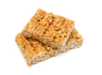 Honey bars with peanuts, sesame and sunflower seeds isolated