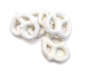 Colorful chocolate covered pretzels on white background