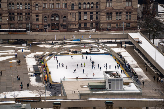 Aerial view of the ice skating rink at Nathan Phillips Square in Toronto. - Powered by Adobe