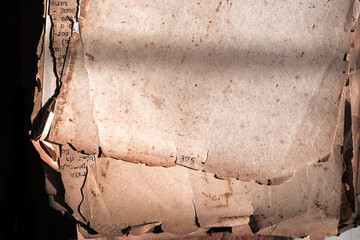 a pile of old paper with a yellowing color, old paper over time, old or worn sheets of paper, old...