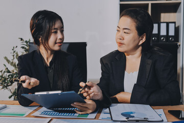 Accounting company provide finance and taxation planning for profitable cash flow, Auditor and accountant team working in office, analyze financial data and accounting record with calculator.Insight