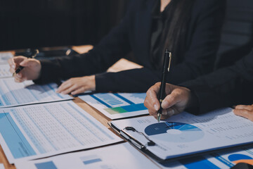 Business analyze,Close up Business people meeting to discuss the situation on the market. Business Financial Concept