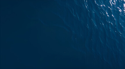 Dark blue ocean surface seen from underwater	
