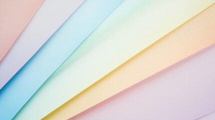Fototapeta premium A soft pastel rainbow gradient background with a textured paper effect, perfect for adding an elegant and whimsical touch to various creative projects such as graphic designs, digital artworks.