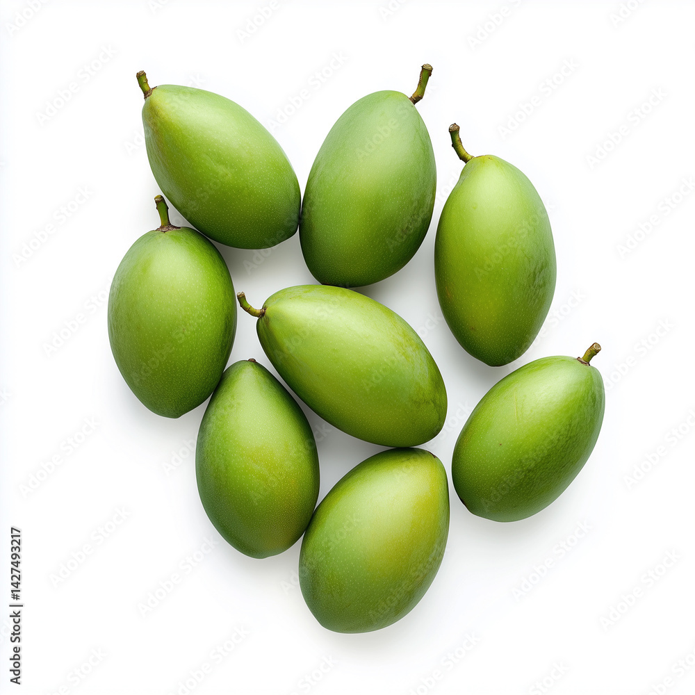 Poster a top view of a group of green mombins arranged on a white surface in a studio setting with soft lig