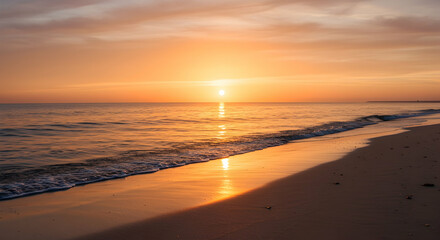 Obraz premium Golden sunset over tranquil ocean waves beach serene coastal landscape nature beauty summer vacation travel destination paradise