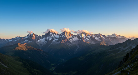 Fototapeta premium Snowy Mountains at Sunset