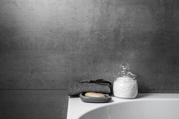 Spa, relaxation, and beauty themes photo, natural magnesium salt, soap, exfoliating loofah in...