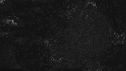 abstract black background with variations in texture and tonality