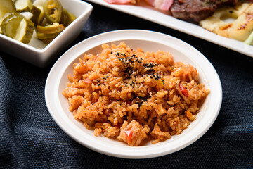 Kimchi fried rice on a white plate
