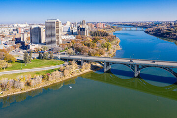 City with a river running through it and a bridge over the water