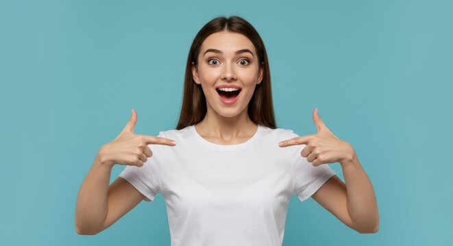 Woman pointing at blank t-shirt