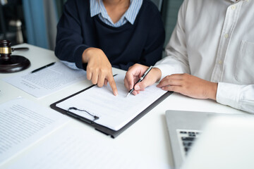 Lawyer businessman working with lawbook in office or courtroom Legal counsel with gavel and legal law. justice and lawyer concept Judge gavel hammer on Lawyer desk.