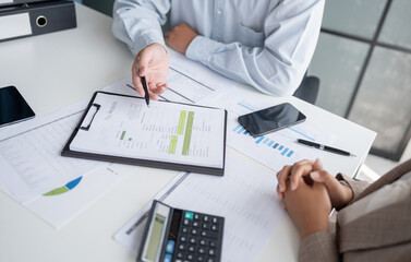 business man Auditor or internal revenue service staff checking annual financial statements company...