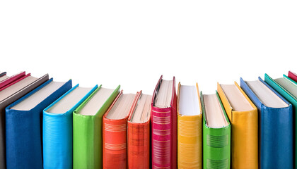 A colorful collection of books lined up against a black background, showcasing various vibrant covers and spines.