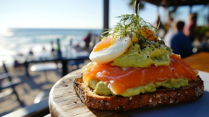 toast with avocado, sliced salmon, and egg. toast. avocado. salmon. egg