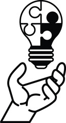 Fototapeta premium hand holding a light bulb in a puzzle piece