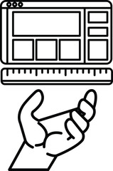 hand holding a ruler over a computer monitor