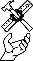 hand holding a hammer and a ruler