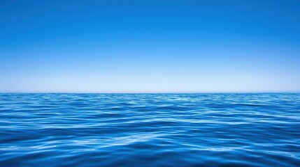 Obraz premium Vast Open Ocean Under Clear Blue Sky Serenity and Calmness