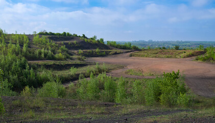 Fototapeta premium Reclaimed landscape on the Saint-Antoine Terril hill in Boussu, Belgium