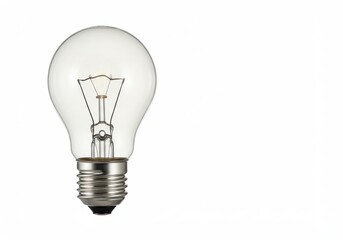 A clear lightbulb with a filament and a metal base on a white background in a studio setting