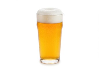 A clear glass filled with golden beer and a thick white foamy head isolated on a white background view