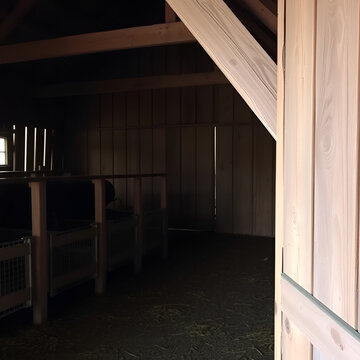 catching pens inside an old wooden barn